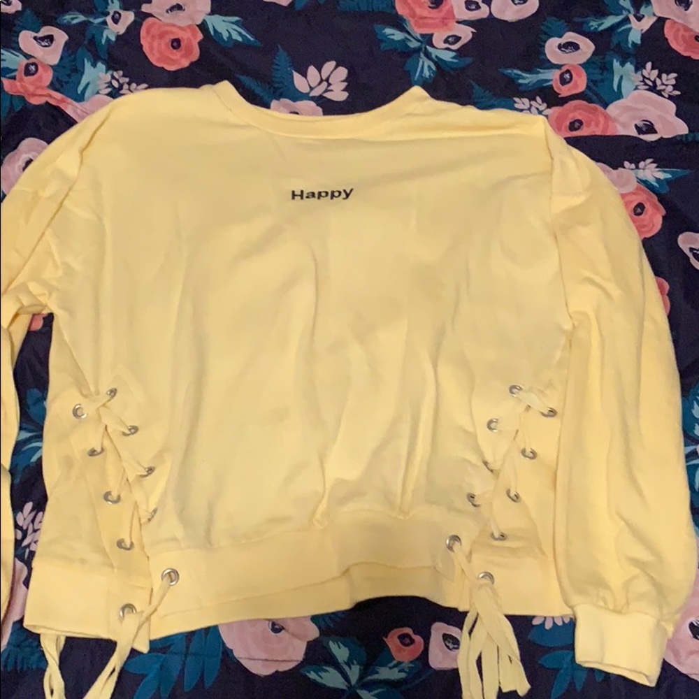 Yellow sweater, or classify as long sleeve.